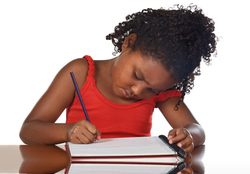 Little girl writing